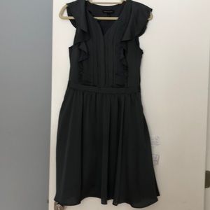 Olive dress with ruffle and please details